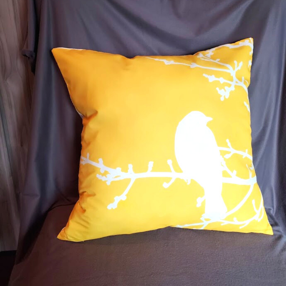 Yellow bird pillow sale